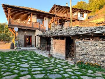 Фото номера Вилла с 2 спальнями Виллы UZUNOVI Guesthouses Leshten г. Лештен 4
